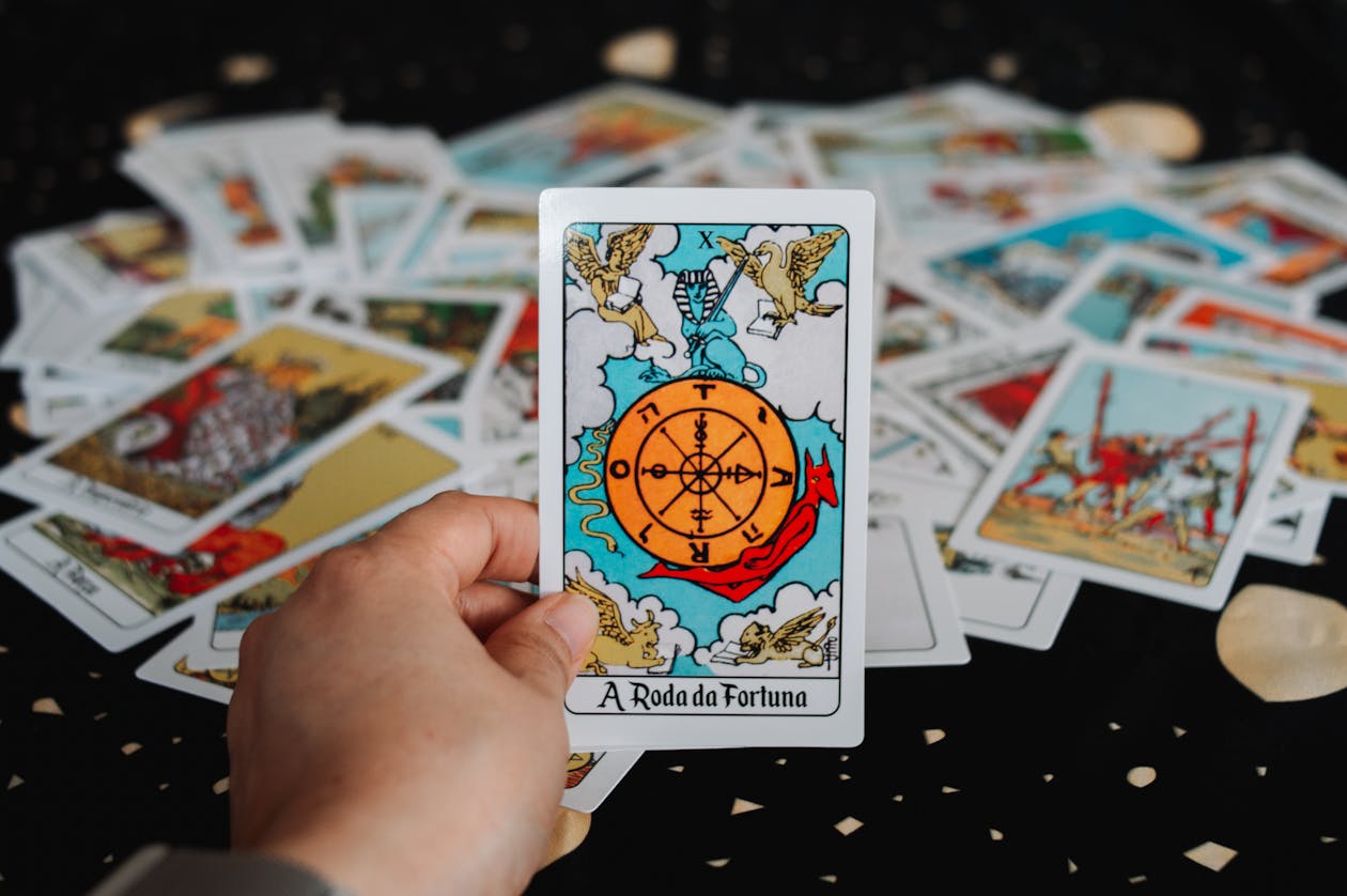 The Wheel of Fortune tarot card representing tarot archetypes of fate and cyclical change