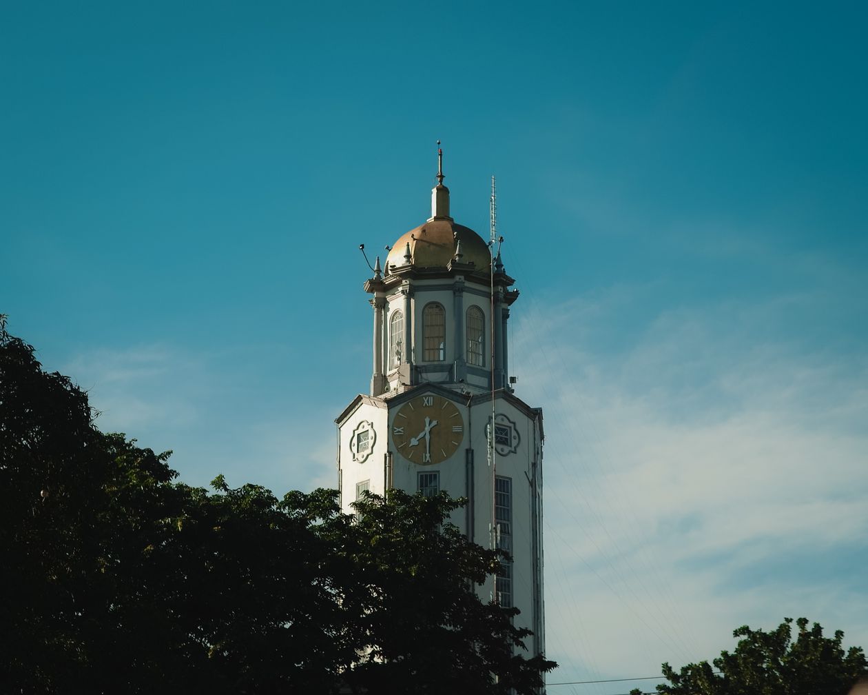 Manila City Hall clock tower representing Philippine government and the Alice Guo CCP Manchurian candidate infiltration case